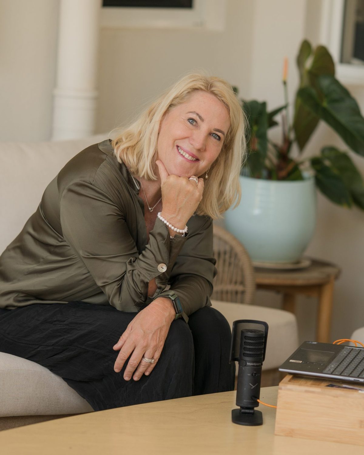 Debbie Thompson recording the podcast